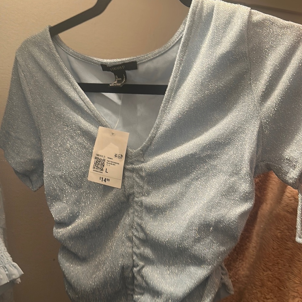 Blue sparkly glittery top
